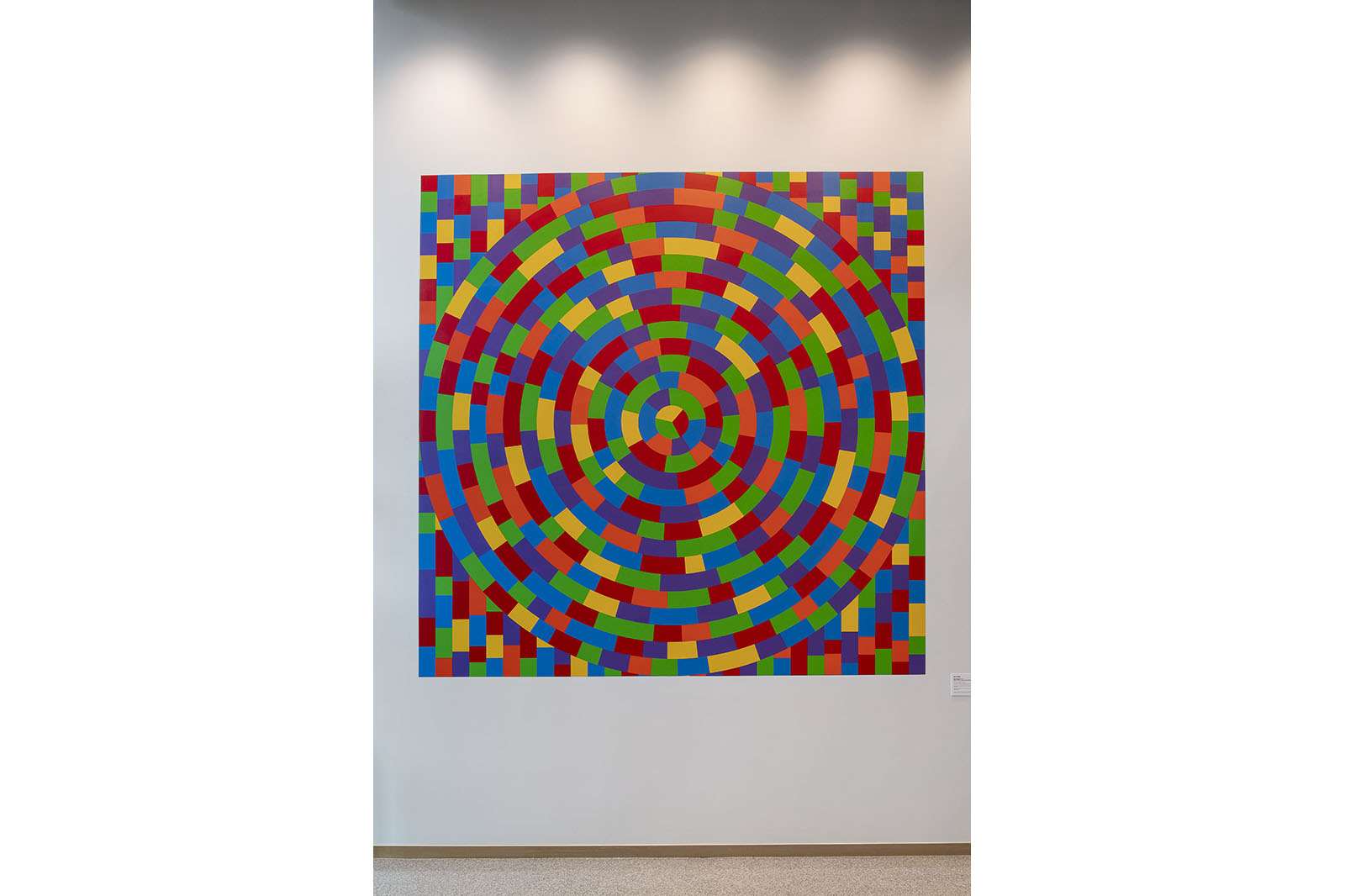 Sol LeWitt, Wall Drawing #1115: Circle within a square, each with broken bands of color, 2014, Acrylic paint, dimensions variable. Gift of Russell H. Pitman. © Estate of Sol LeWitt / Artists Rights Society (ARS), New York. Photo by Nash Baker.