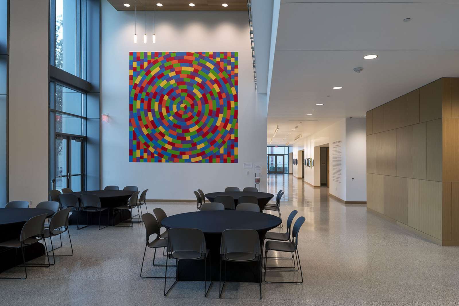 Sol LeWitt, Wall Drawing #1115: Circle within a square, each with broken bands of color, 2014, Acrylic paint, dimensions variable. Gift of Russell H. Pitman. © Estate of Sol LeWitt / Artists Rights Society (ARS), New York. Photo by Nash Baker.