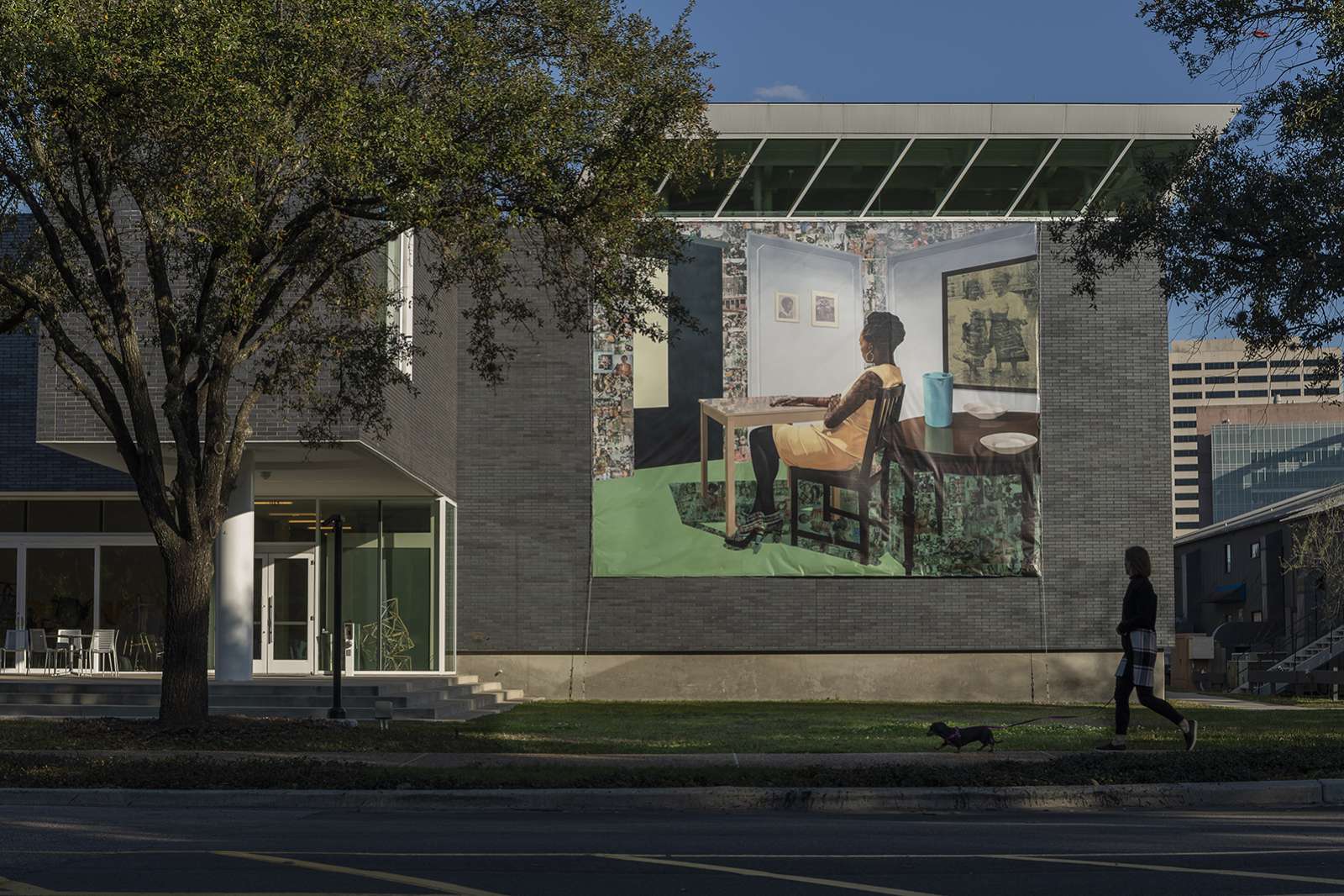 Njideka Akunyili Crosby, In the Lavender Room, 2019. Banner created from original artwork. Moody Center for the Arts. Photo by Nash Baker.