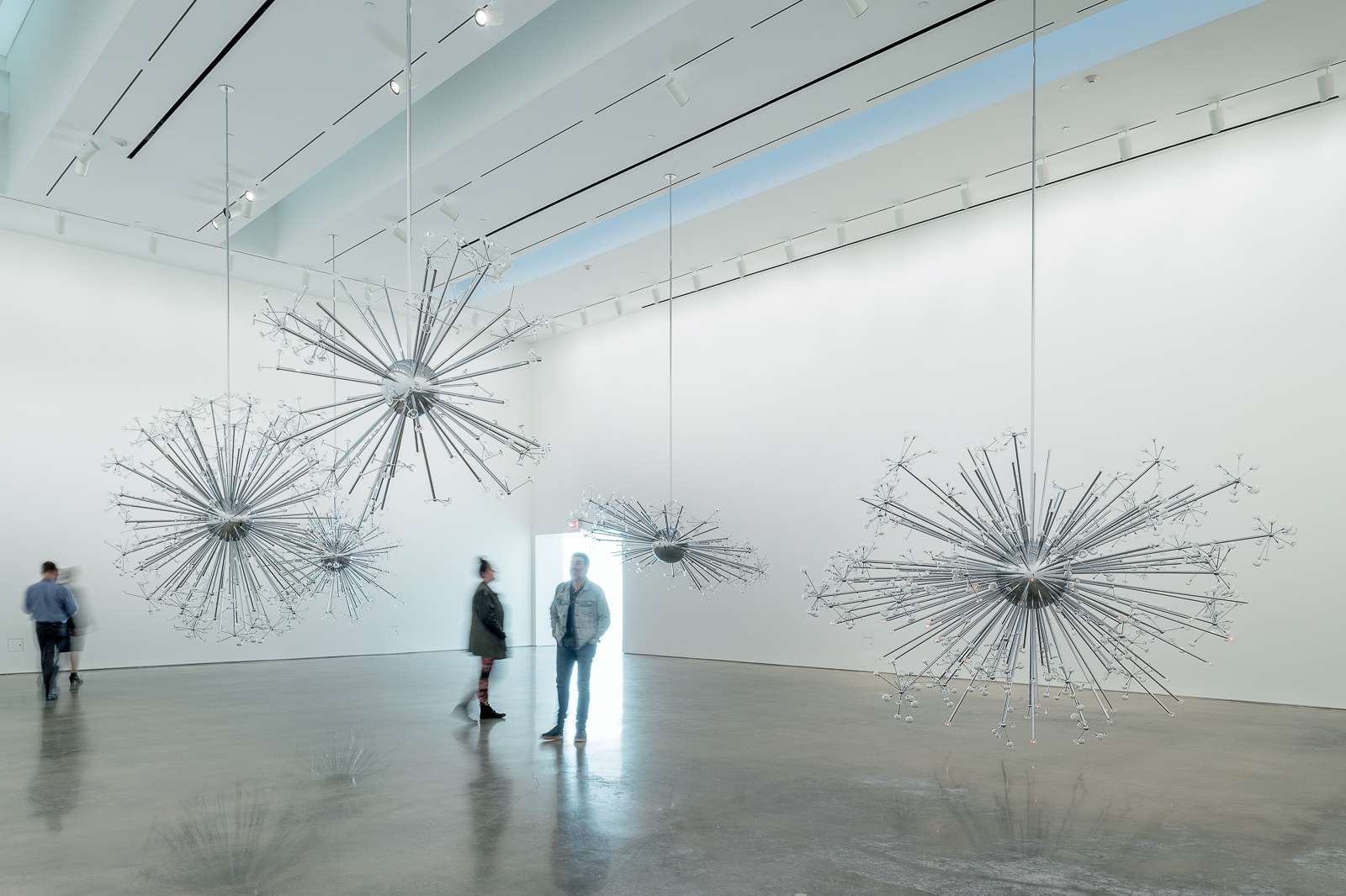 Installation view of Island Universe by Josiah McElheny, 2008. Chrome plated aluminum, handblown and molded glass, electric lighting, and rigging. Dimensions variable. Courtesy the artist. Photo: Nash Baker