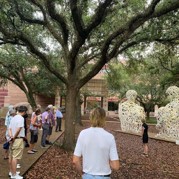 Alison Weaver and Sip + Stroll guests at the Jaume Plensa, Mirror sculpture