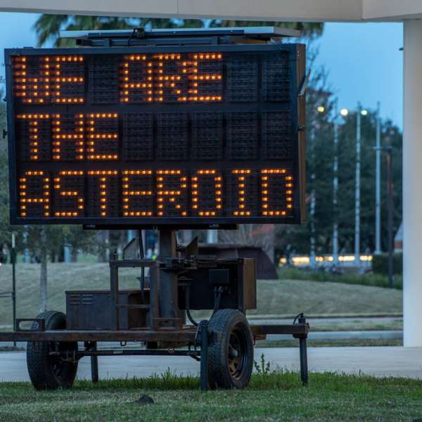 WE ARE THE ASTEROID III, 2019. Text and sandblasted, solar-powered LED message board. Text by Timothy Morton. Approx. 152” x 84”/ 386 cm x 213 cm. Photo: courtesy of the artist 
